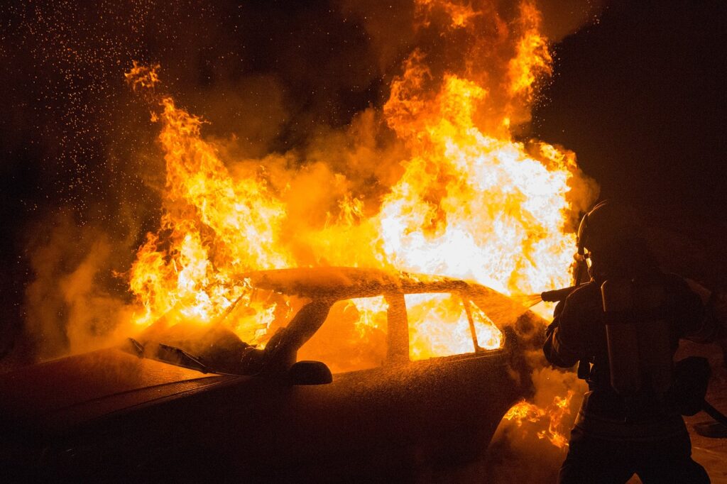 poor leaders crash and burn firefighter putting out car fire