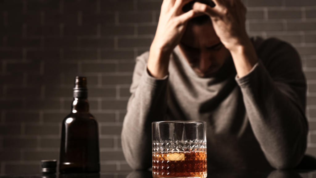 man frustrated with alcohol ready to drink