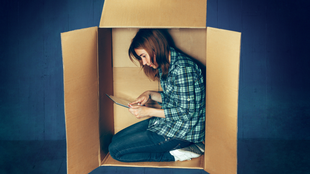 limited dreams, woman in box with tablet
