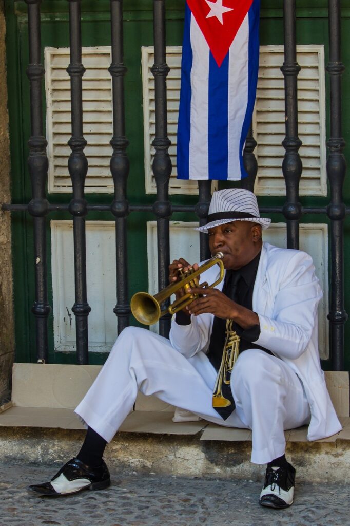 trumpeter jazzing on the sidewalk